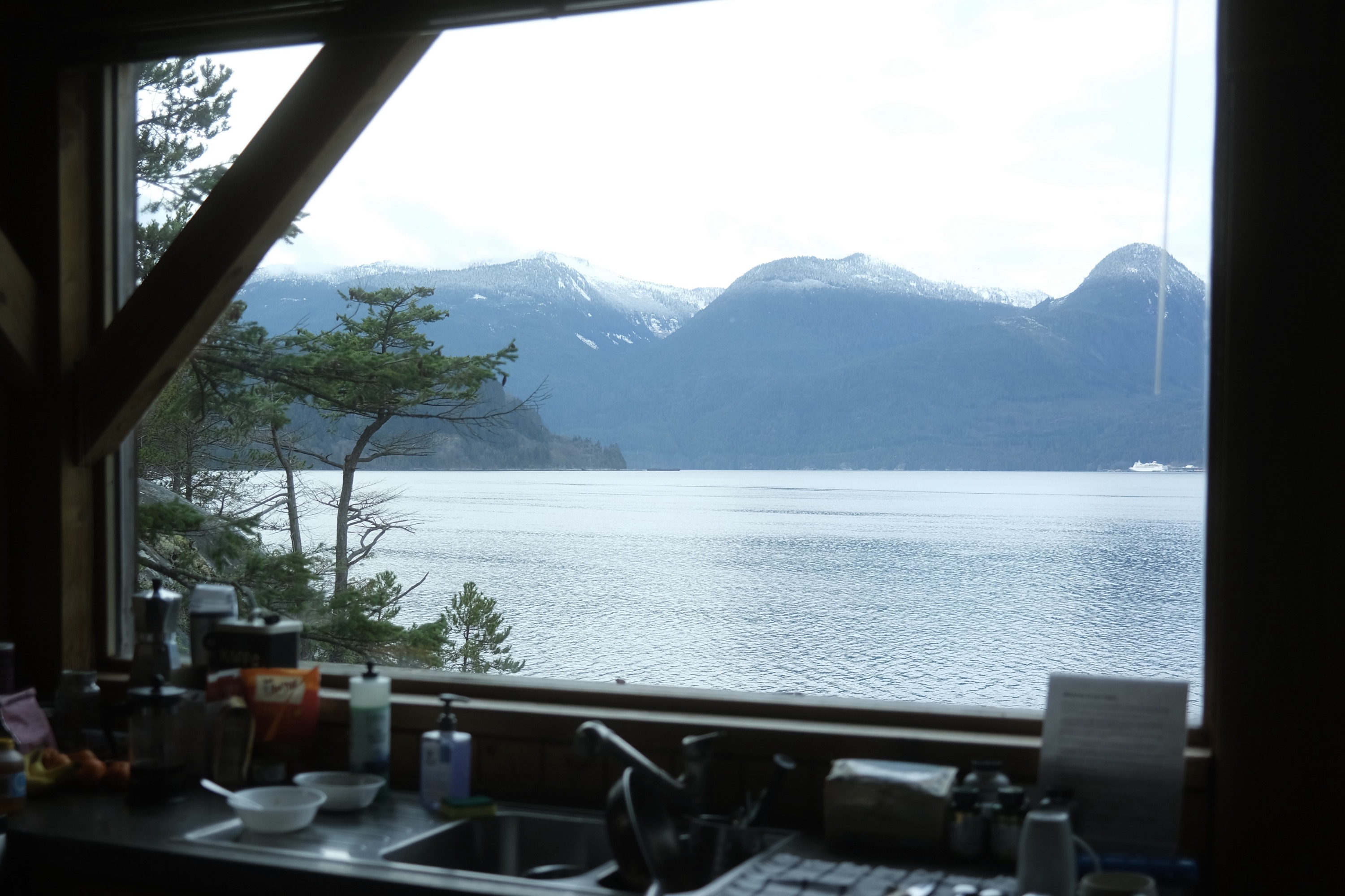 View of Squamish Harbour and mountains from cabin window.