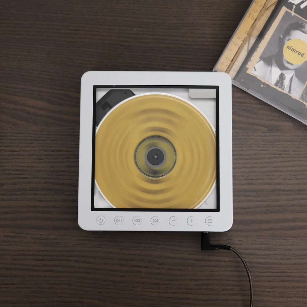 Nimrod by Green Day CD spinning in a player.