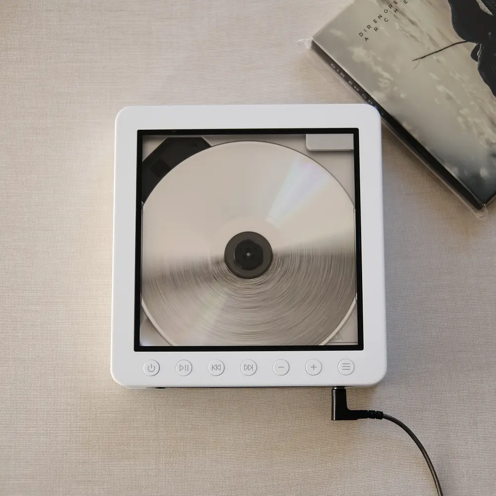 ARCHE by DIR EN GREY CD spinning in a player.