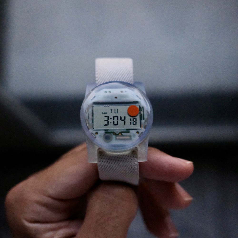 Photo of Solid State Watch with orange dot sticker.